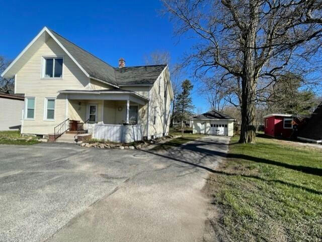 302 W PARKDALE AVE, MANISTEE, MI 49660, photo 1 of 28